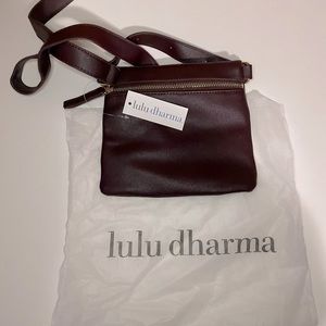 Lulu Dharma square belted fanny pack.